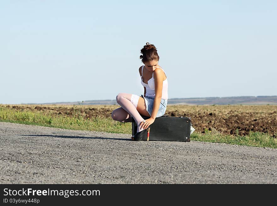 The lonely girl on road