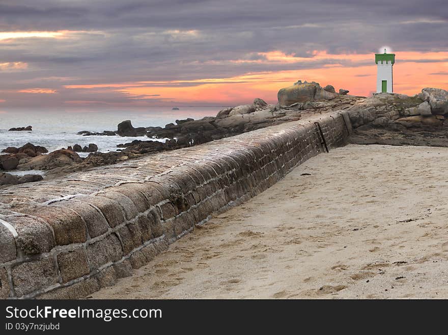 Colorful sunset with lighthouse, near the Atlantic, France. Colorful sunset with lighthouse, near the Atlantic, France