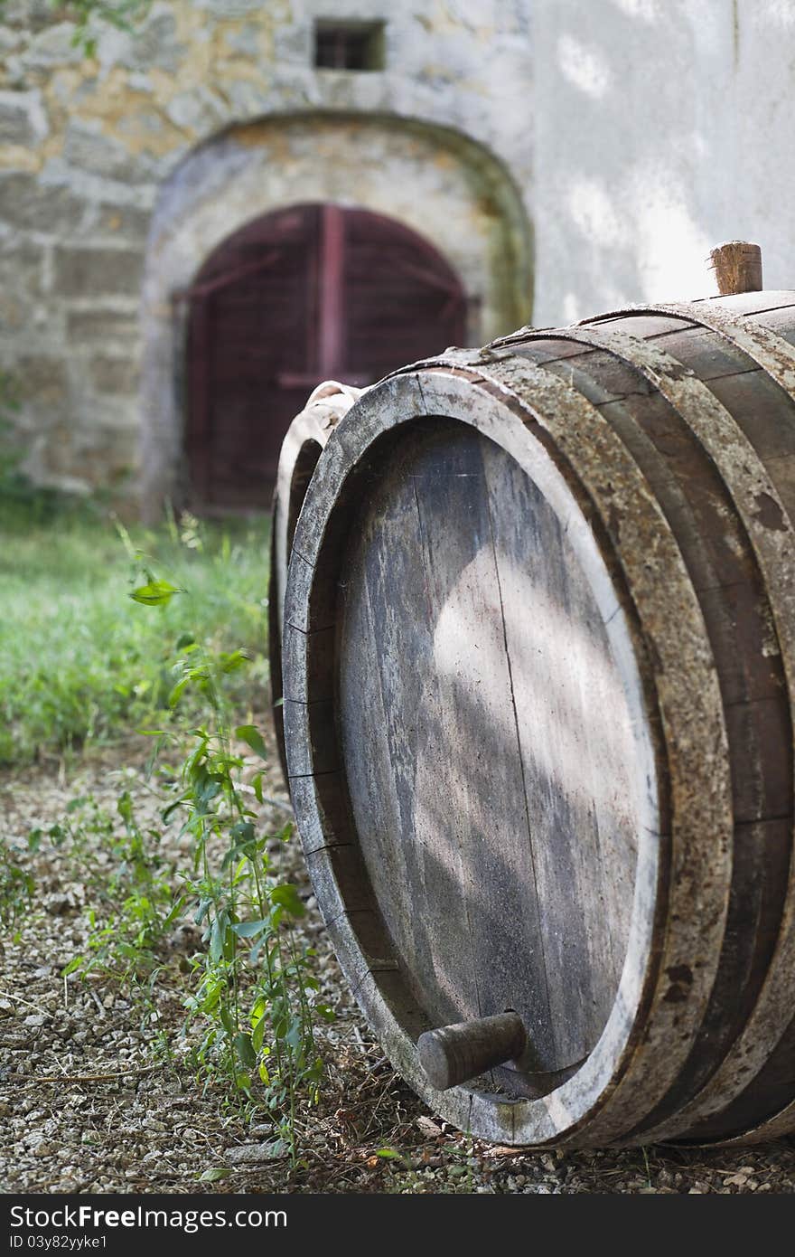 Old, abandoned barrels near  a vine cellar.