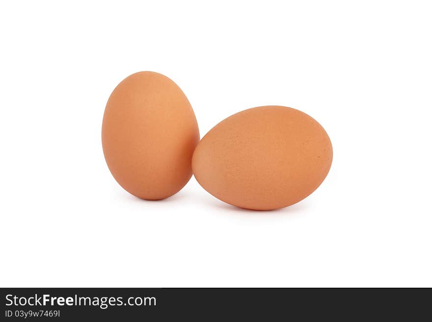 Two raw eggs on white background. Isolated with clipping path