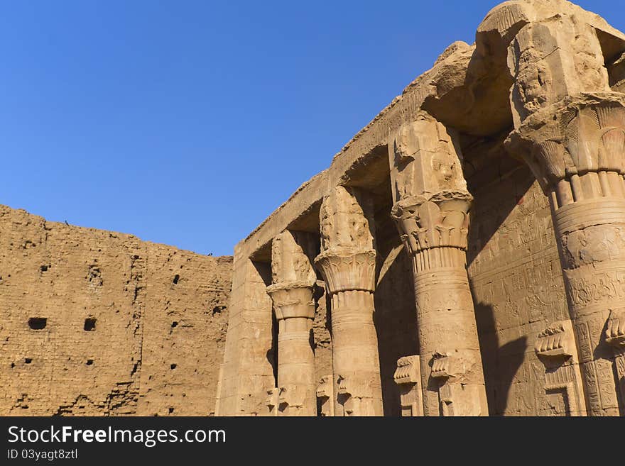 Detailed view of the pillars near the temple of the god Horus (Edfu, Egypt). Detailed view of the pillars near the temple of the god Horus (Edfu, Egypt)