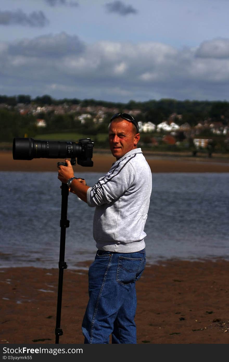 Professional photographer photographing the River Exe. Professional photographer photographing the River Exe.