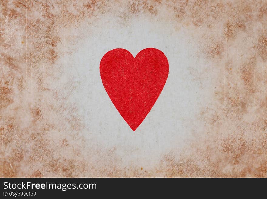 Heart symbol surrounded by a brownish stained texture