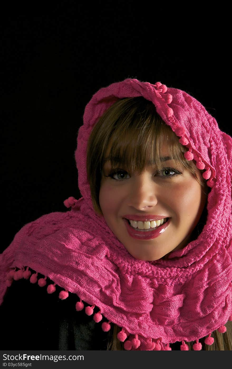 Pretty Young Girl in Pink Head Wrap on Black Backround. Pretty Young Girl in Pink Head Wrap on Black Backround.