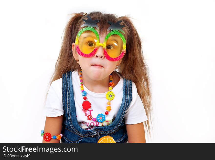 Cute girl in funny glasses with surprised expression on her face. Cute girl in funny glasses with surprised expression on her face