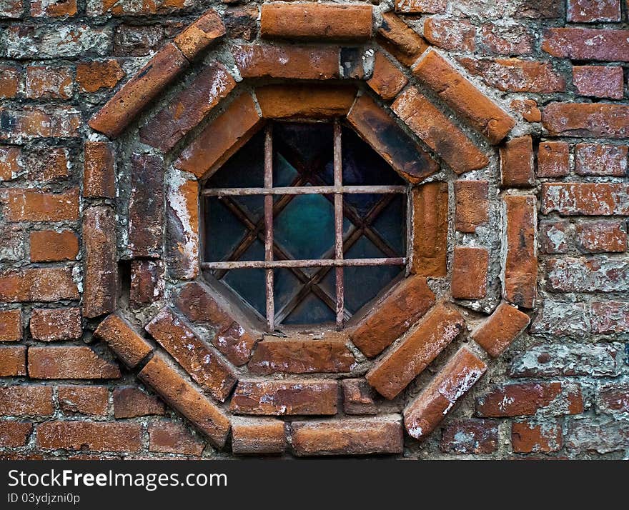 Ancient stained window with grating. Ancient stained window with grating