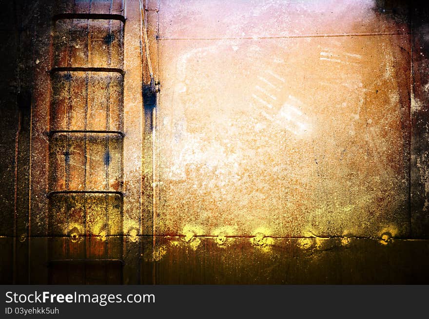 The yellow dirty railway tank. Background in style grunge. The yellow dirty railway tank. Background in style grunge.