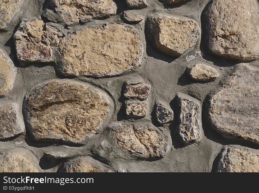 Masonry made from big irregular shaped boulders in old historical district of Minsk city. Masonry made from big irregular shaped boulders in old historical district of Minsk city