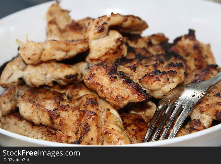 A table of shicken bites. A table of shicken bites