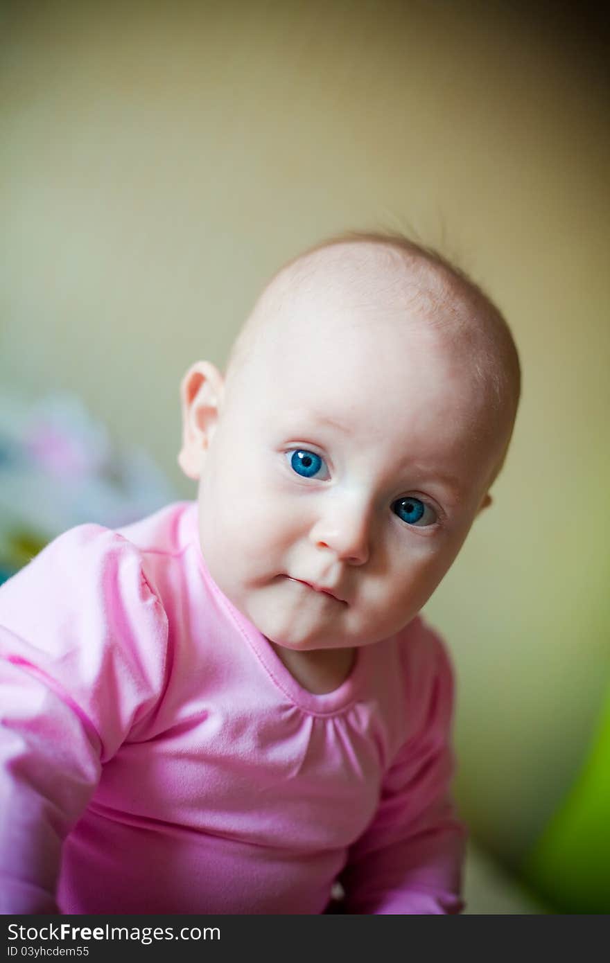 Little baby girl with blue eyes, in pink shirt. Little baby girl with blue eyes, in pink shirt