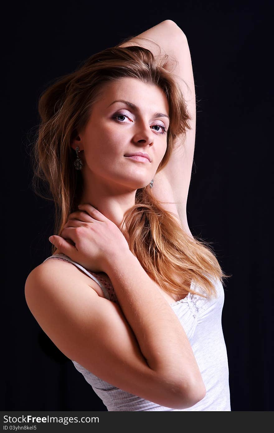 Close-up portrait of caucasian young woman on black background. Close-up portrait of caucasian young woman on black background