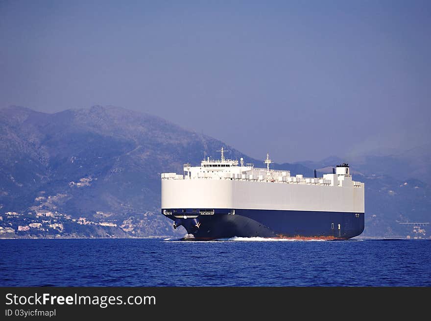 A cargo ship or freighter is a vessel that carries goods, and materials from one port to another. A cargo ship or freighter is a vessel that carries goods, and materials from one port to another