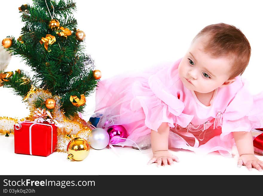 Small Santa Claus with gift on a white background