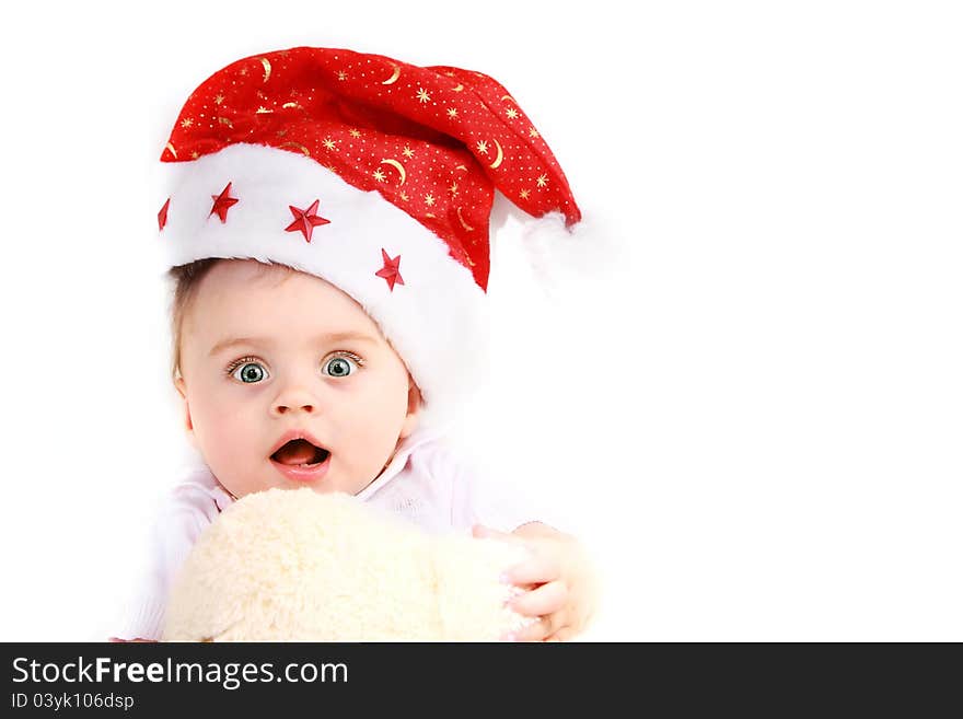 Babe in santa hat isolated on white background. Babe in santa hat isolated on white background