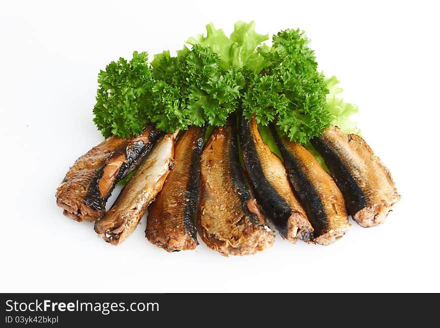 Smoked sprats in oil on white background