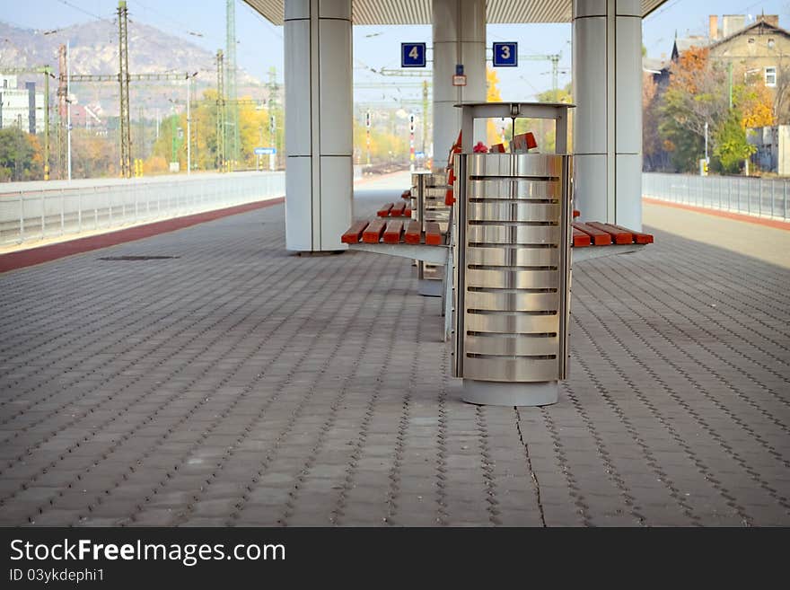 Metal trash can on a railway station. Metal trash can on a railway station