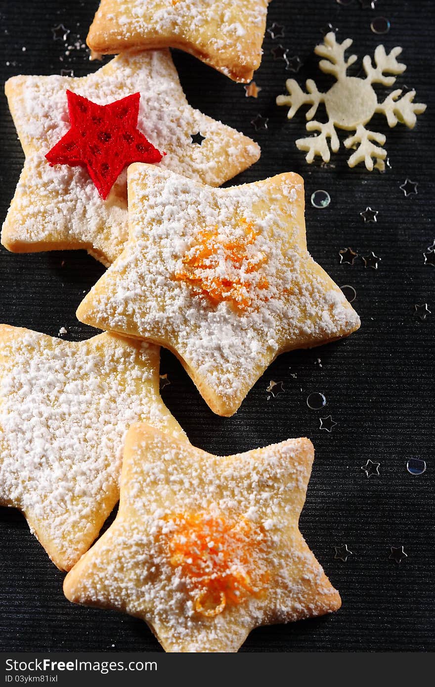 Christmas butter cookies on black background