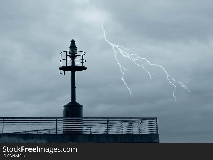 Cloudy sky and lightning over the pier. Cloudy sky and lightning over the pier