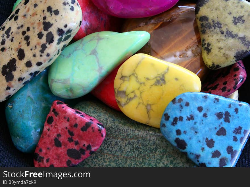 Polished colored stones background