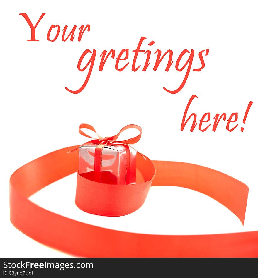 Red ribbon with present box  on white with space for text