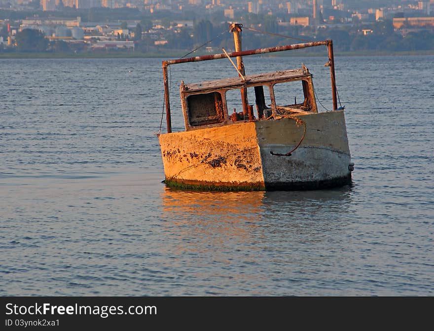 Boat sank in the lake near the town. Boat sank in the lake near the town