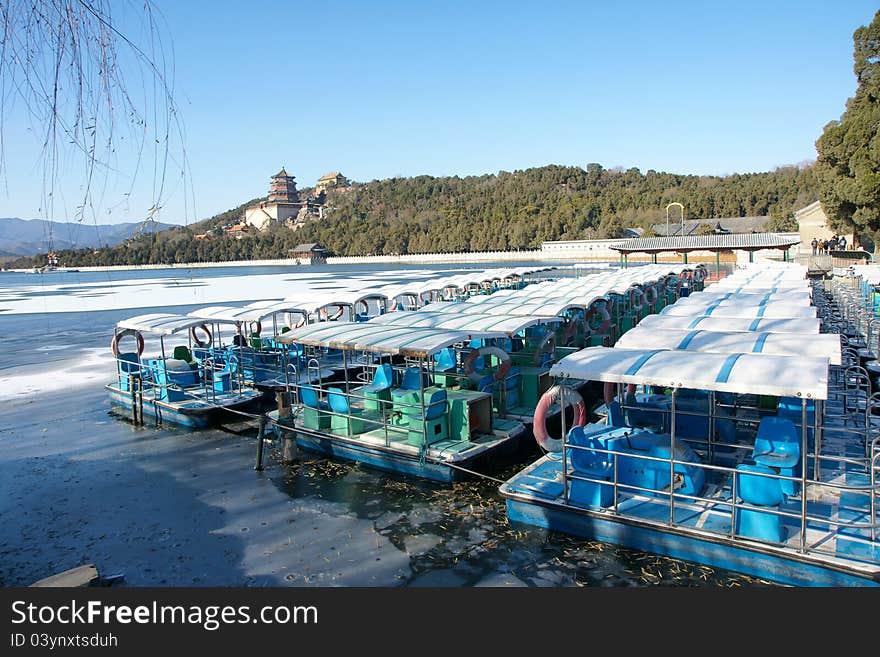 The yachts of Summer Palace in Beijing, China. Summer Palace is the royal garden of Qing Dynasty China. The yachts of Summer Palace in Beijing, China. Summer Palace is the royal garden of Qing Dynasty China.