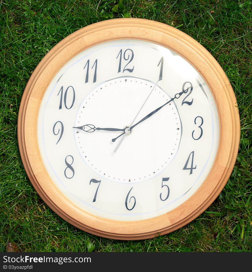 Clock on the grass