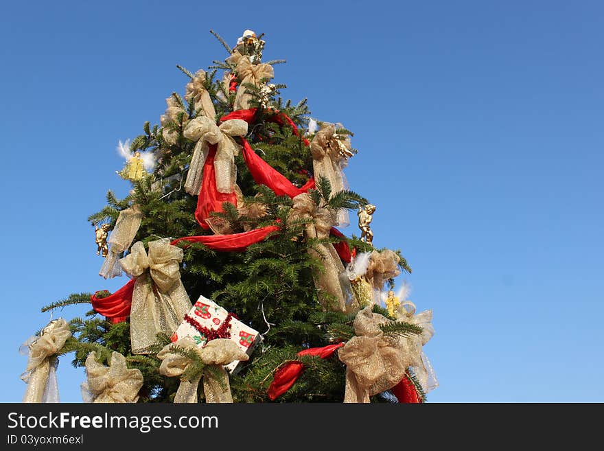 Decoration and gifts in the tree of Christmas. Decoration and gifts in the tree of Christmas