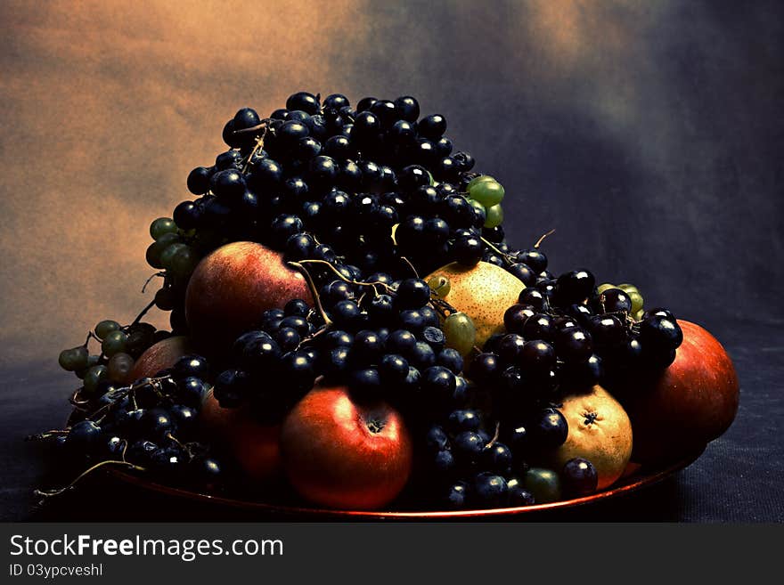 Grapes and apples, studio shot