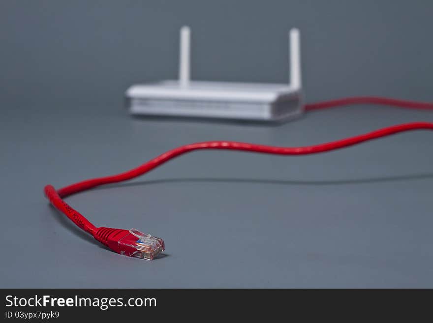 Ethernet cable coming from wireless router with double antenna