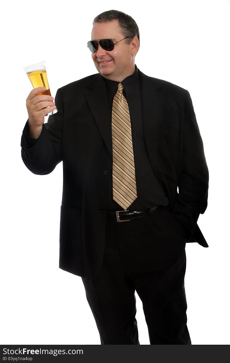 Man inspecting his glass of beer