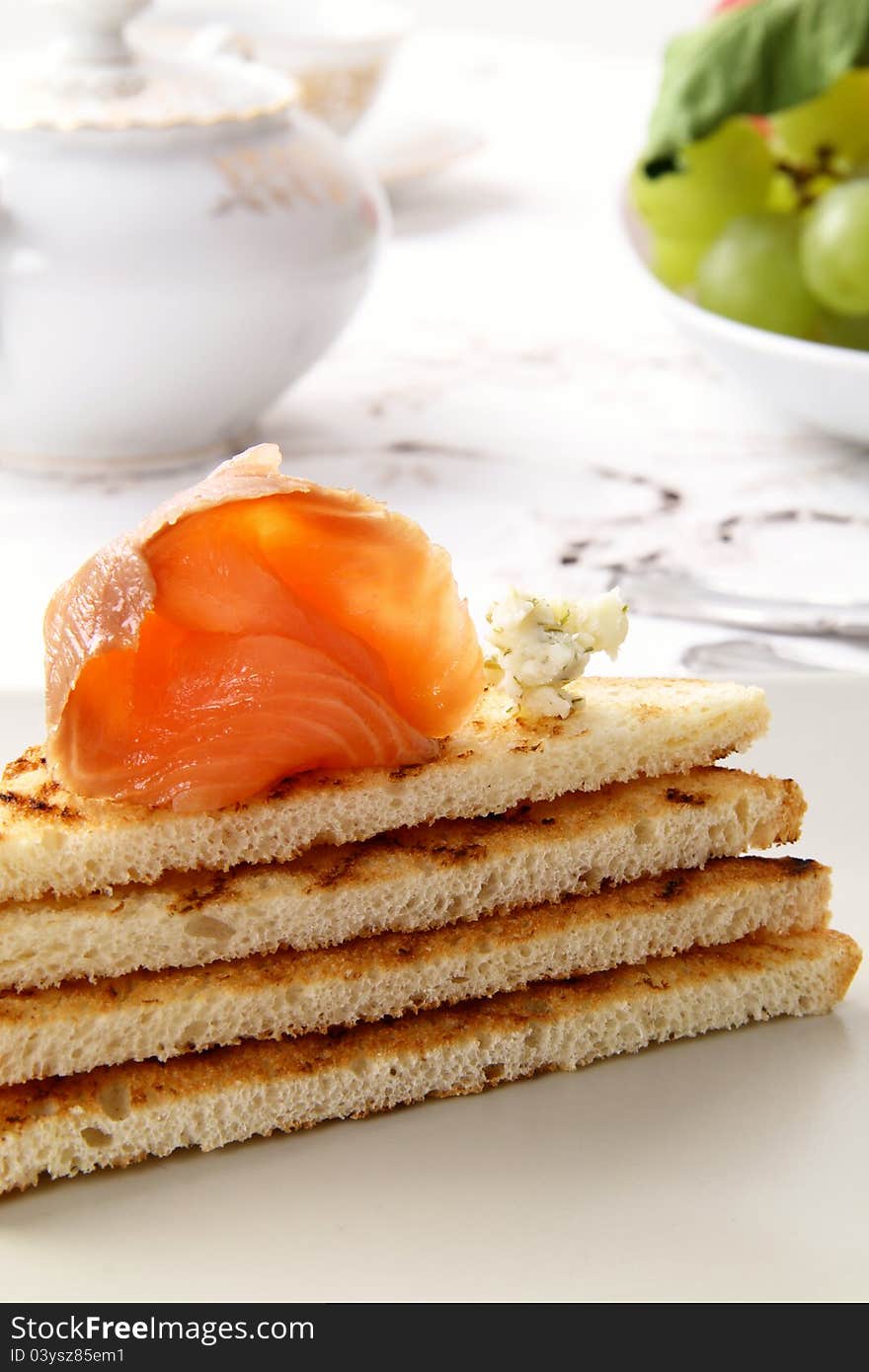 Salmon smoked end bread on white background