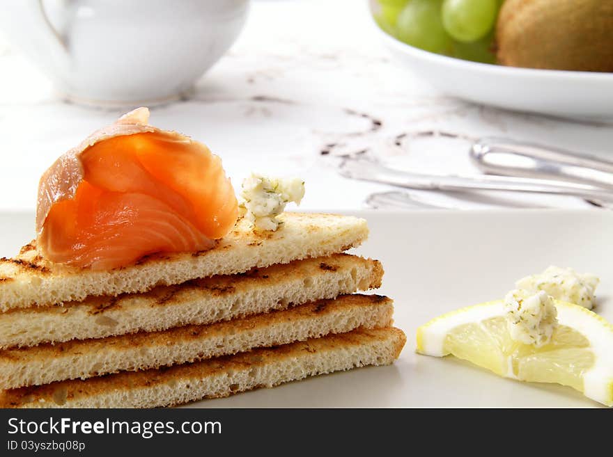 Salmon smoked end bread on white background