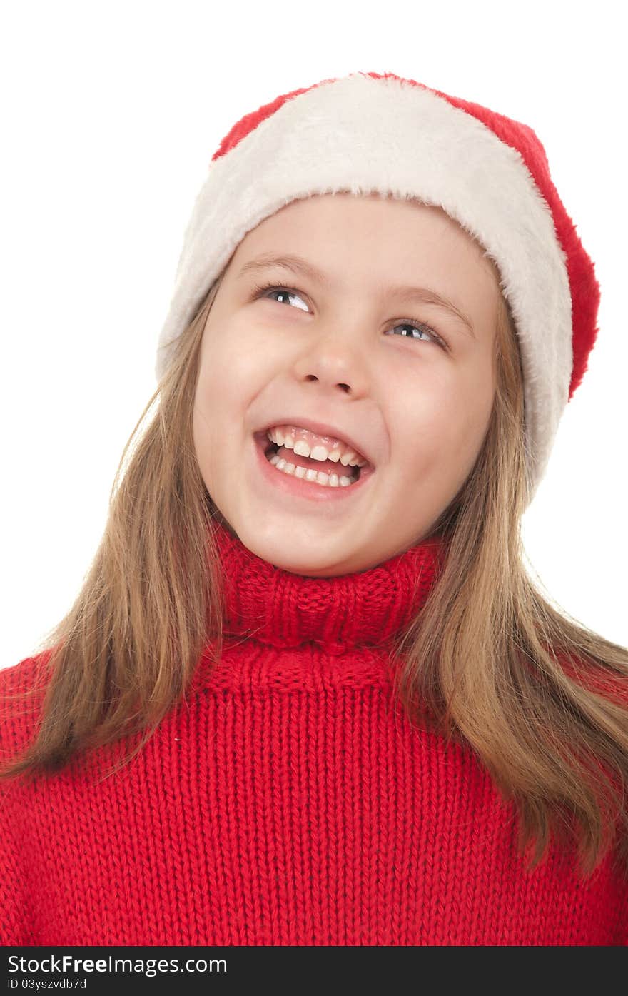 Portrait of beautiful little girl wearing santa claus clothes. Isolated on a white background