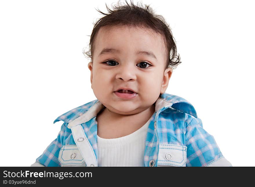 Adorable Indian baby laughing a over white background