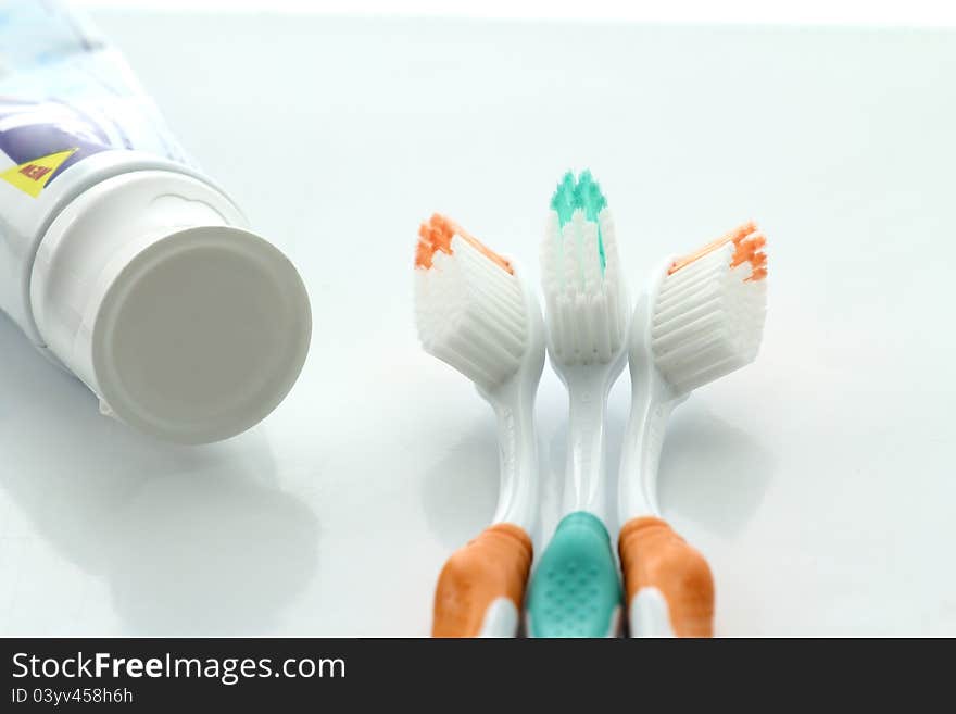Toothbrush and toothpaste on a white background. Toothbrush and toothpaste on a white background