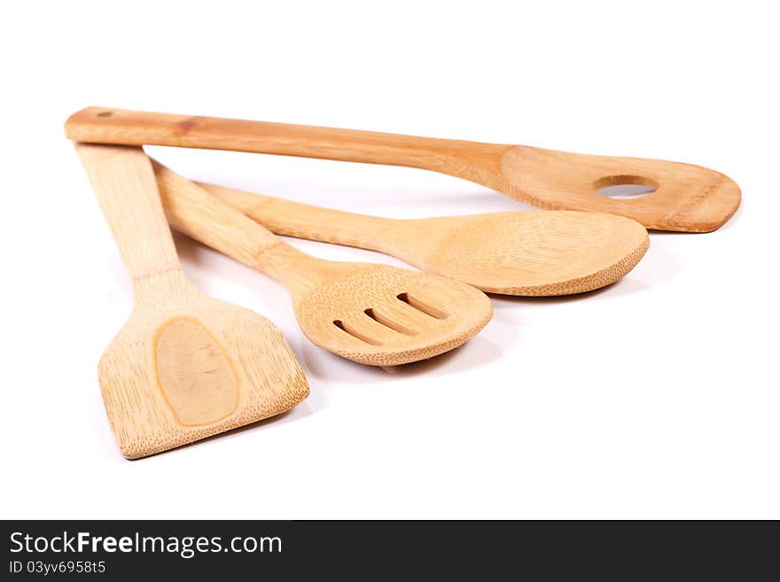 Wooden kitchen utensils  on white background