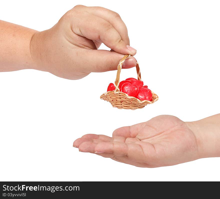 Wicker basket full of heart shape candy