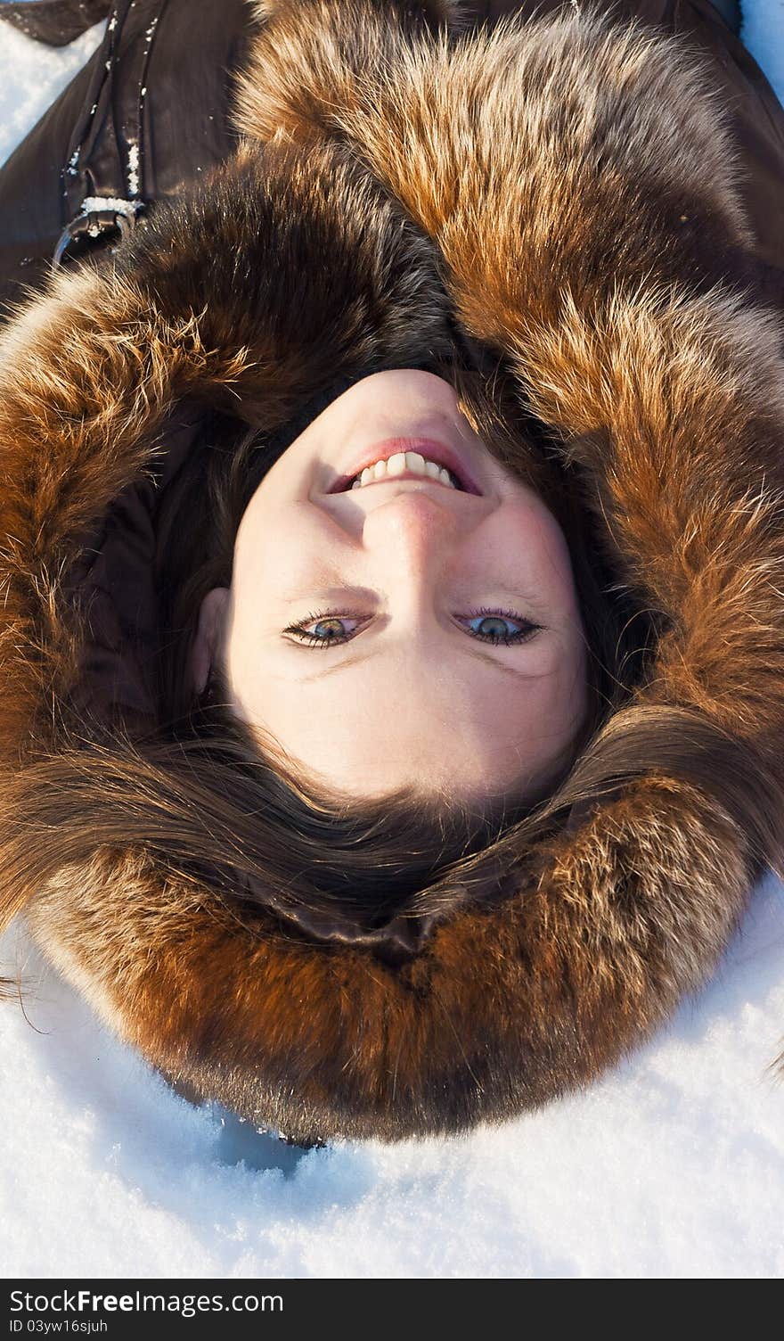 Winter portrait of young woman on snow. Winter portrait of young woman on snow