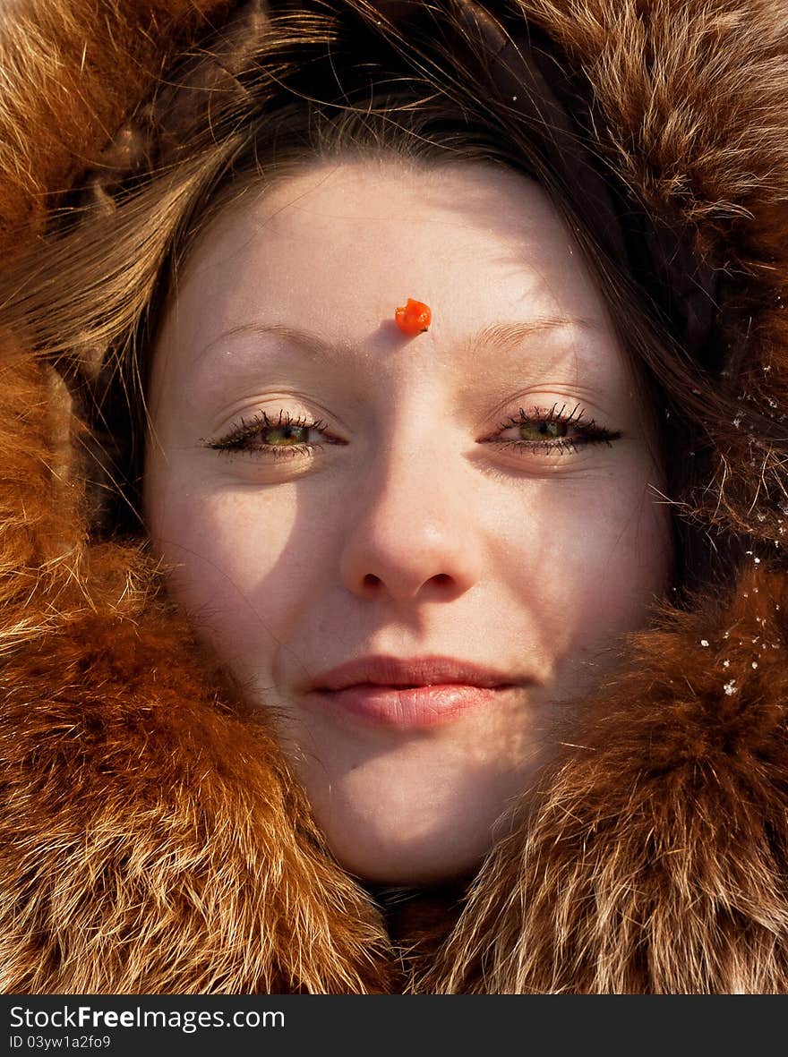 Young woman with mountain ash berry. Young woman with mountain ash berry