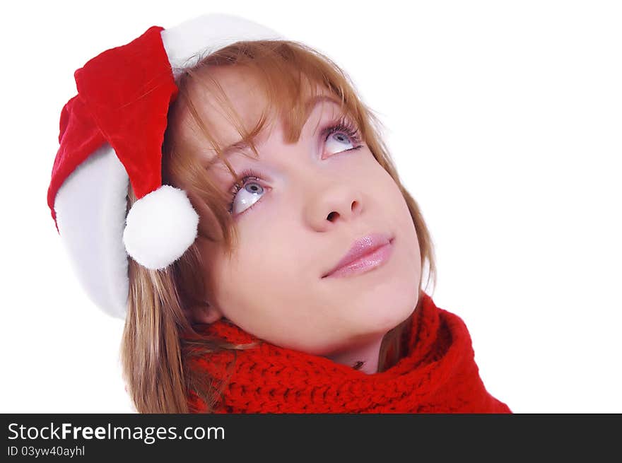 Girl with christmas hat and scarf over white. Girl with christmas hat and scarf over white