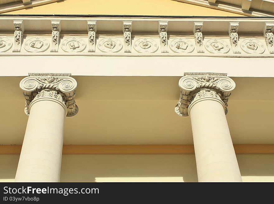 Columns and capitals of ionic order of a historic building. Columns and capitals of ionic order of a historic building