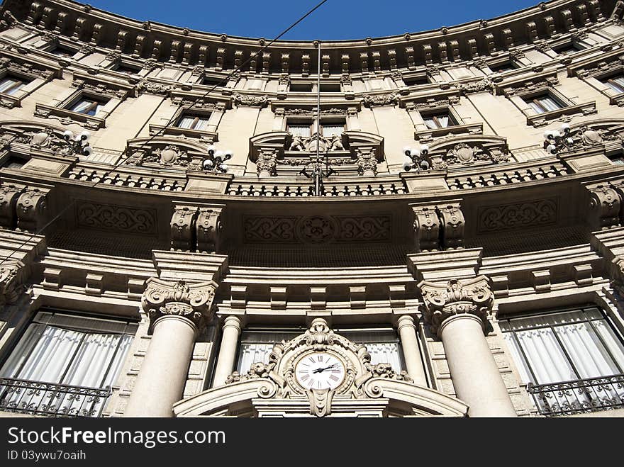 Italian old bank with a clock on the facade. Italian old bank with a clock on the facade