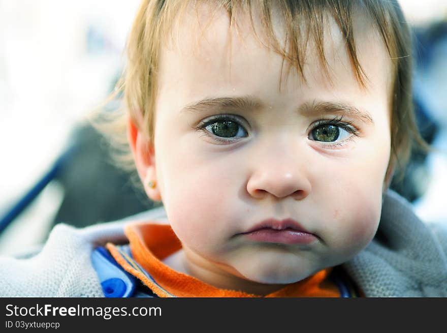 Portrait of a beautiful baby girl with nine months