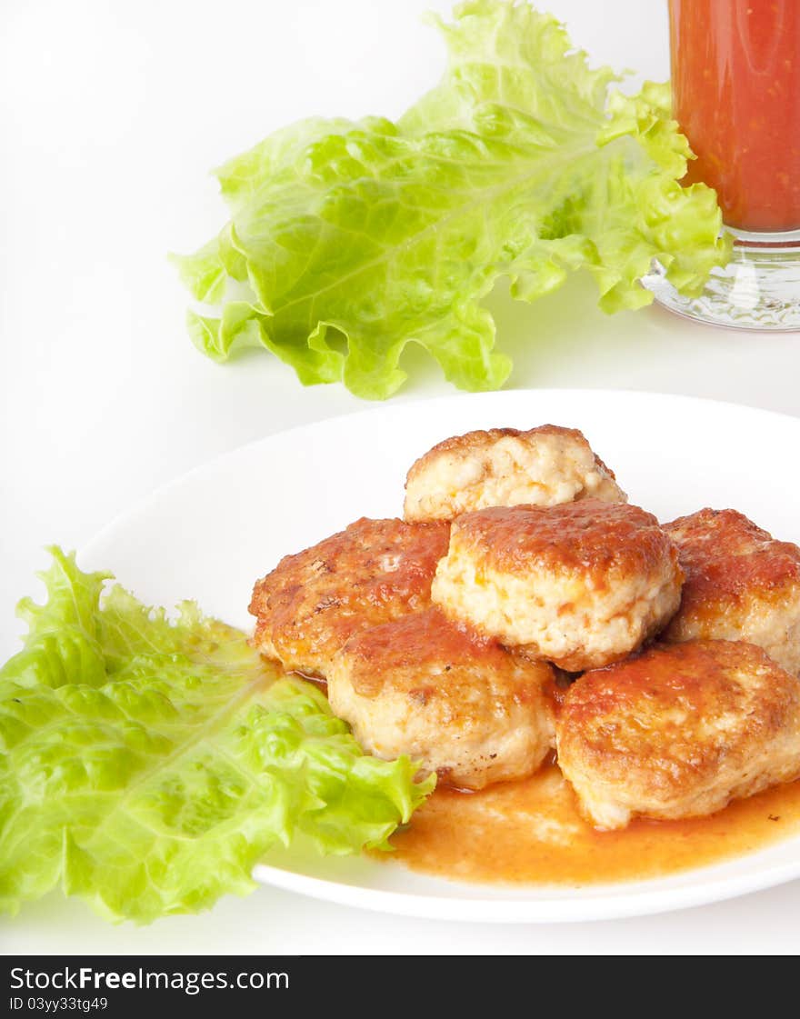 Meat balls on the Japanese dish on a white background. Meat balls on the Japanese dish on a white background