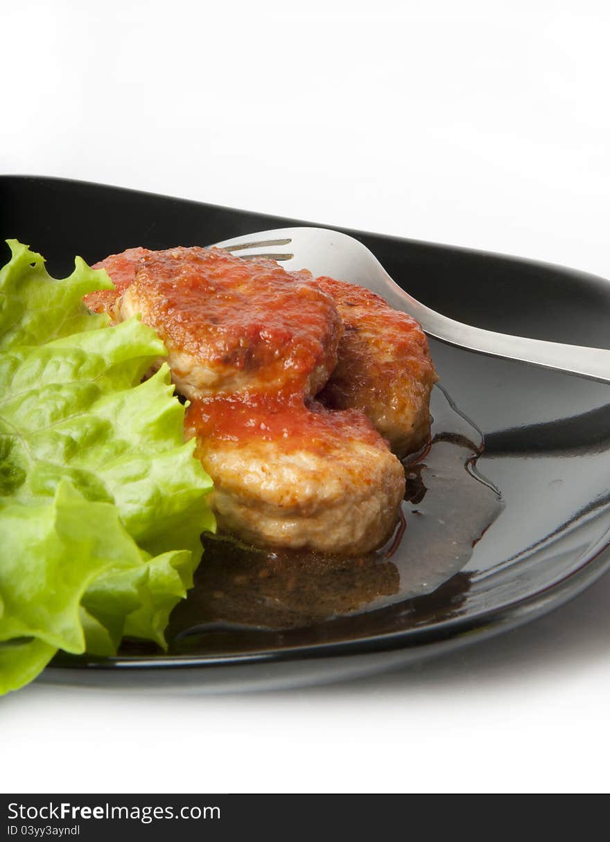 Meat balls on the Japanese dish on a white background. Meat balls on the Japanese dish on a white background