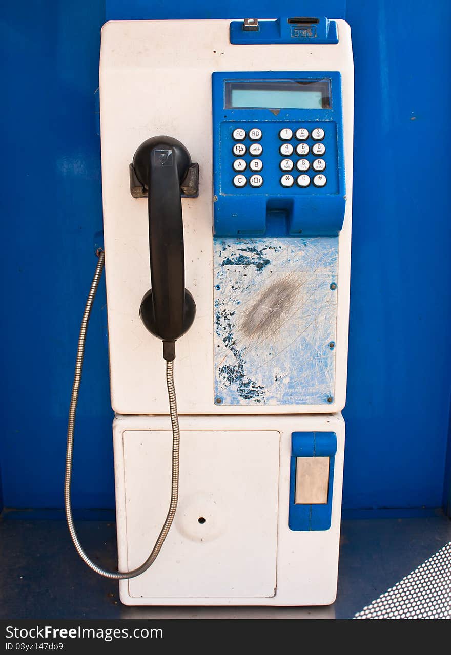 Public telephone very old but still usable.