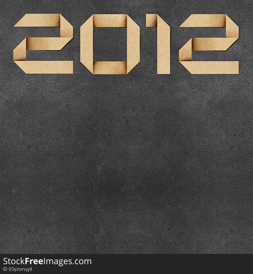 Happy new year 2012  Recycled PaperCraft Background. Happy new year 2012  Recycled PaperCraft Background.