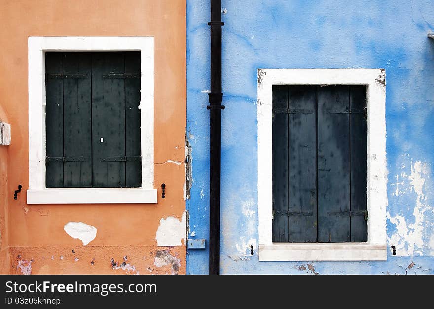 Burano island near Venice, colored windows