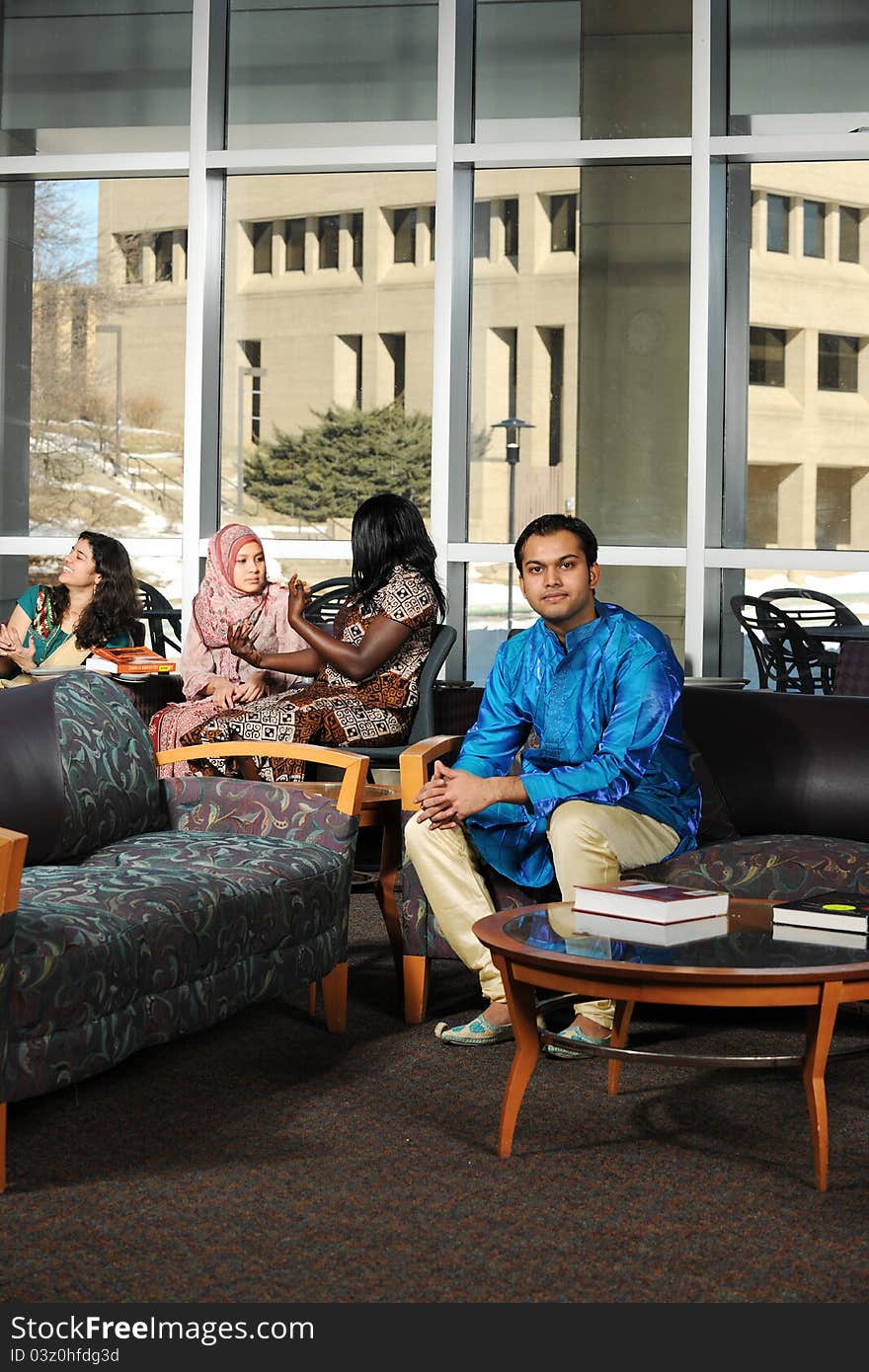 Group of Diverse College Students wearing their traditional attire in the University Campus